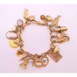 A 9 ct gold charm bracelet. 20 cm long. 61.9 grammes total weight.