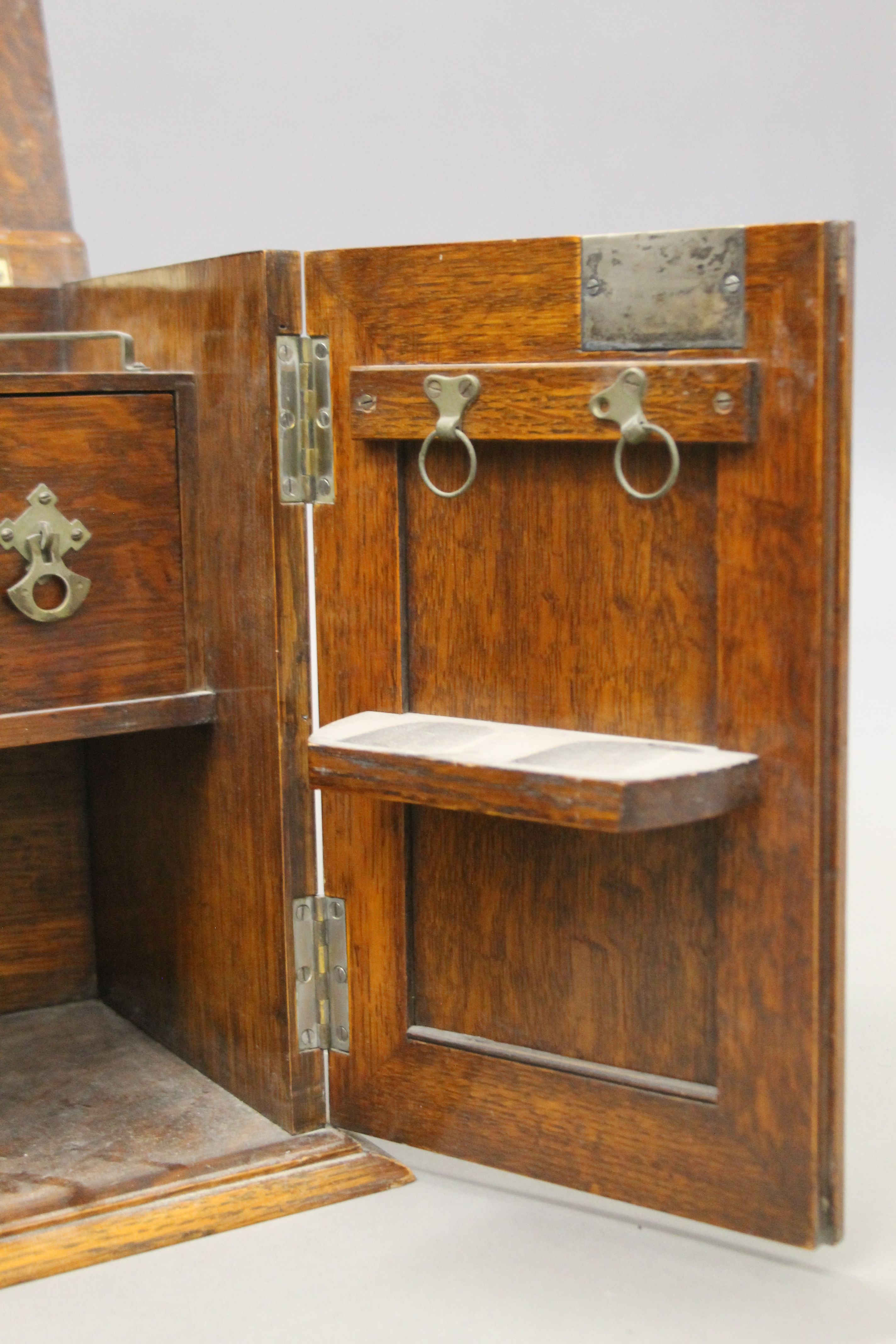 An early 20th century oak smoker's cabinet. 37 cm wide. - Image 4 of 7