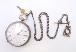 A Waltham silver pocket watch and chain. Watch 5.5 cm diameter, chain 33 cm long.