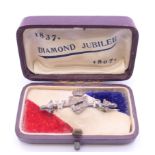 A Victorian 1837-1897 Jubilee brooch, in original box. 4 cm long.