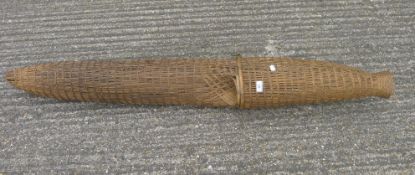 A vintage wicker eel trap. 150 cm long.