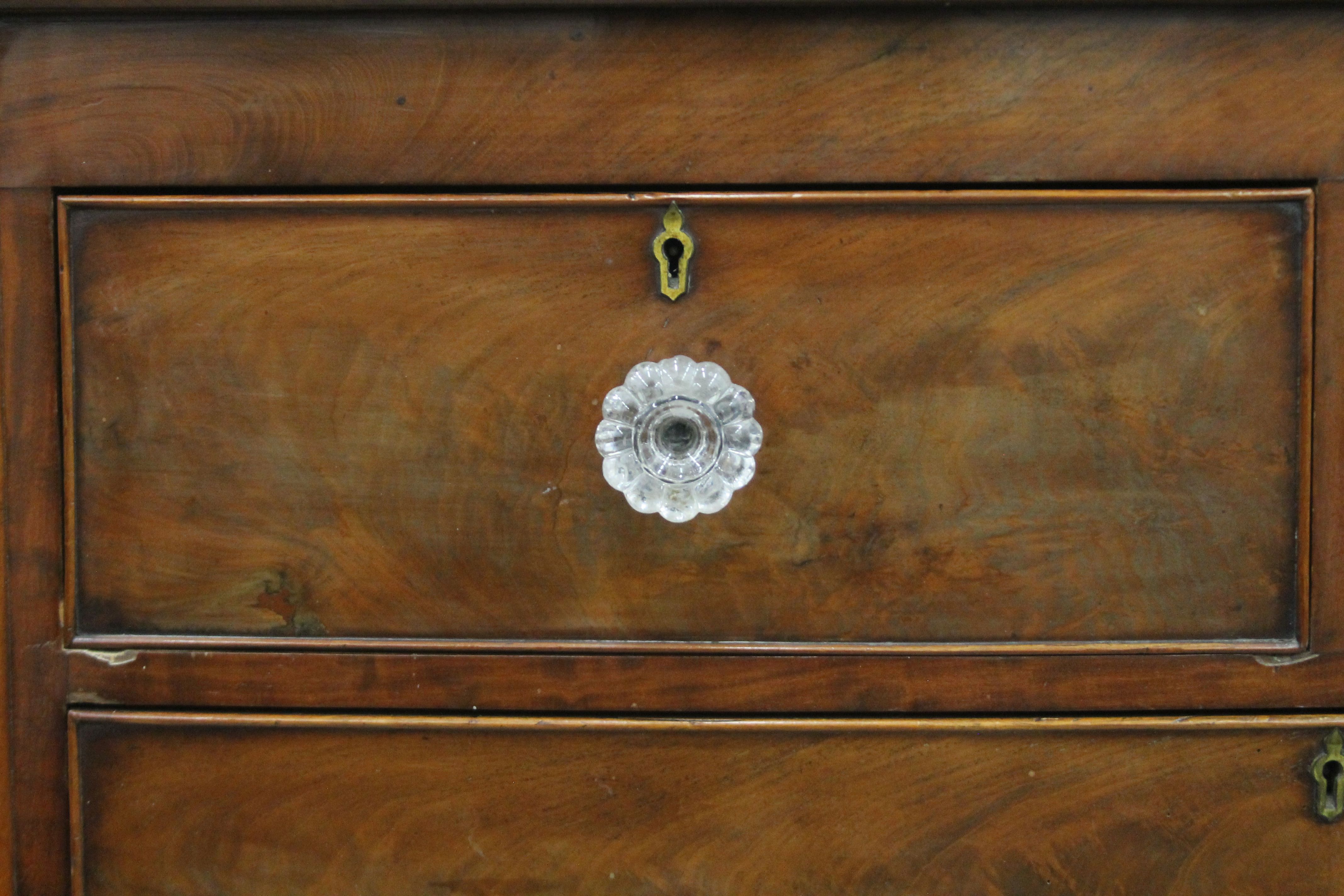 A Victorian mahogany bow front chest of drawers. - Image 4 of 9
