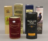 Six boxed bottles of Whisky - Usquaebach, Highland Park, Justerini and Brooks, The Black Grouse,