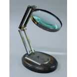 A magnifier glass on stand.