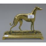 A brass mantle ornament formed as Colonel North's Fullerton (one of the greatest coursing