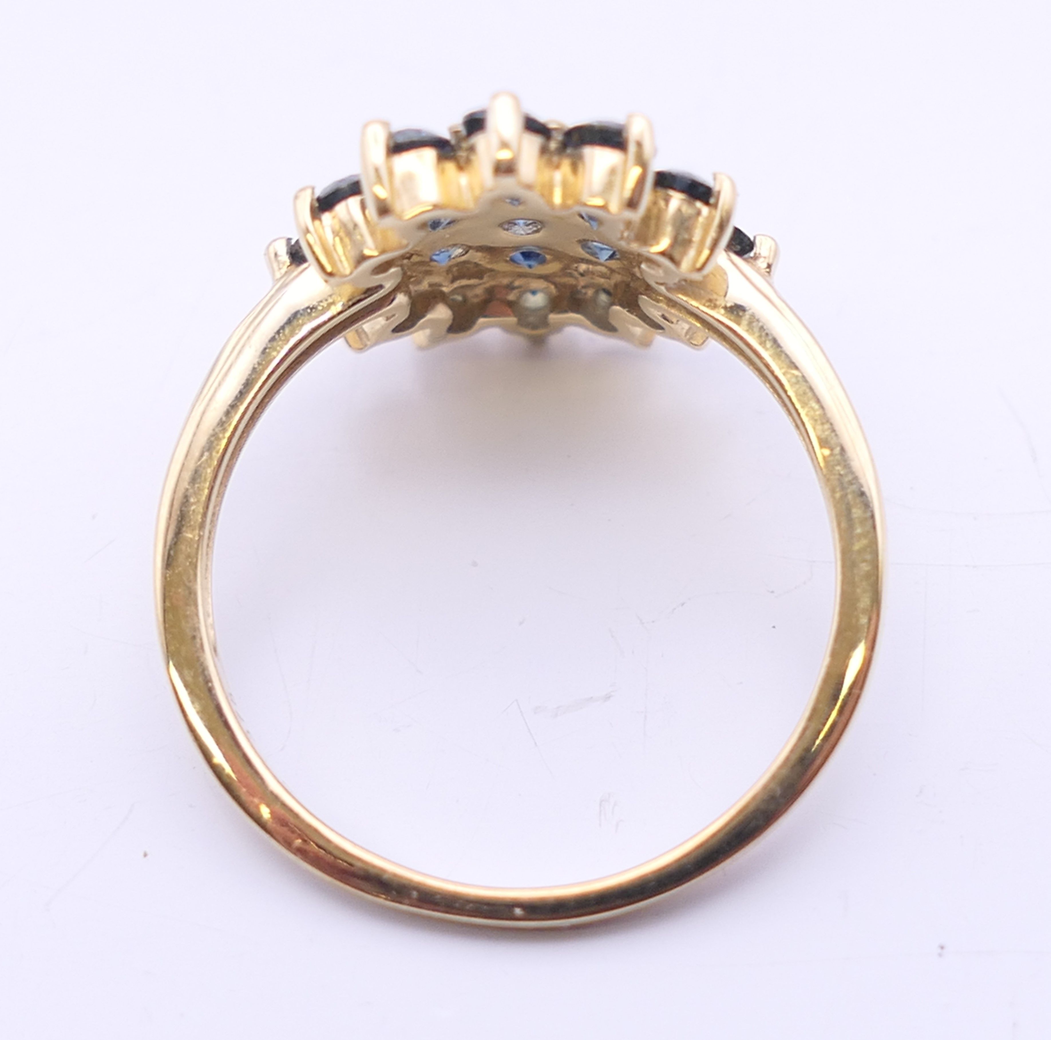 A 9 ct gold Gemporia ring. Ring size N/O. 2.5 grammes total weight. - Image 4 of 5