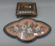 An early Victorian mother-of-pearl inlaid rosewood workbox and a Victorian beadwork stand.