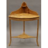 A 19th century pine corner washstand. 69 cm wide.