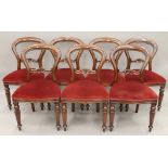 A set of seven Victorian style mahogany dining chairs and a Regency style mahogany pedestal dining