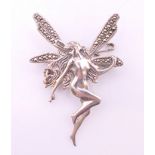 A silver fairy form brooch. 5 cm high.