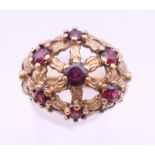 A 9 ct gold garnet ring. Ring size L. 6 grammes total weight.