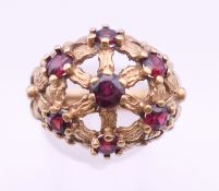 A 9 ct gold garnet ring. Ring size L. 6 grammes total weight.