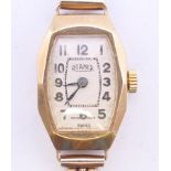 A 9 ct gold cased Roamer ladies wristwatch on a 9 ct gold strap. 13.7 grammes total weight.