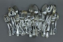 A quantity of Georgian and Victorian matched silver flatware. Approximately 110 troy ounces.