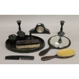 An early 20th century ebony dressing table set.