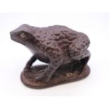 A frog form netsuke. 4.5 cm high.