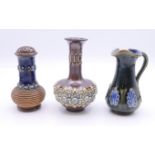 A Doulton pepperet, miniature vase and miniature jug. Pepperet 8.5 cm high, vase 9.5 cm high, jug 8.