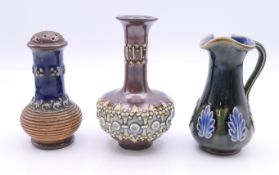 A Doulton pepperet, miniature vase and miniature jug. Pepperet 8.5 cm high, vase 9.5 cm high, jug 8.