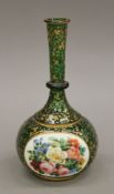 A Bohemian green glass gilded florally decorated vase. 20.5 cm high.