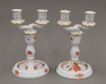 A pair of Herend porcelain candelabra. 22 cm high.