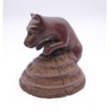 A dog form netsuke. 4.25 cm high.