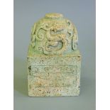 A Chinese stone seal. 14 cm high.