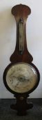 A Victorian rosewood banjo barometer. 112 cm high.