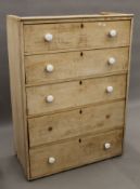 A Victorian pine chest of drawers. 93.5 cm wide, 131 cm high, 47 cm deep.