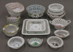 A collection of Herend porcelain baskets.