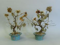A pair of Chinese hard stone mounted trees, in cloisonne box. Each approximately 39 cm high.