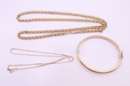 Two chains and a bangle. Chains 62 cm and 42 cm, bangle 6 cm internal diameter.