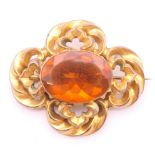 A Victorian Pinchbeck citrine set brooch. 4.5 x 4 cm.