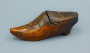 A 19th century Dutch clog form treen snuff box. 13 cm long.