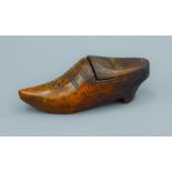 A 19th century Dutch clog form treen snuff box. 13 cm long.