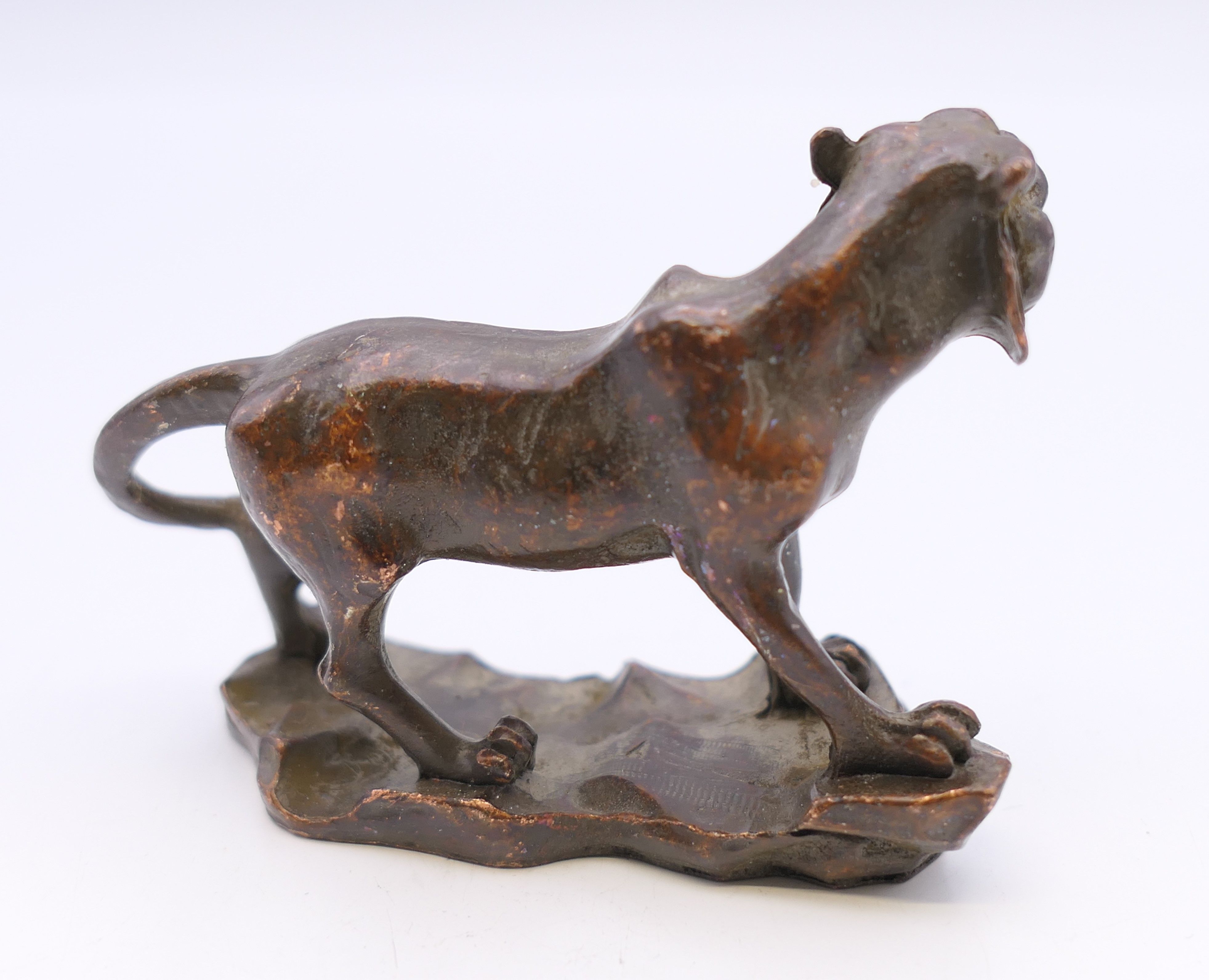 A bronze model of a tiger. 5.5 cm high, 6.5 cm long. - Image 2 of 4