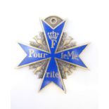 A blue enamel medal. 5 cm high.