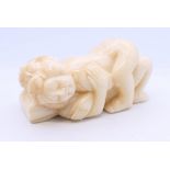 An erotic bone netsuke. 5.5 cm long.