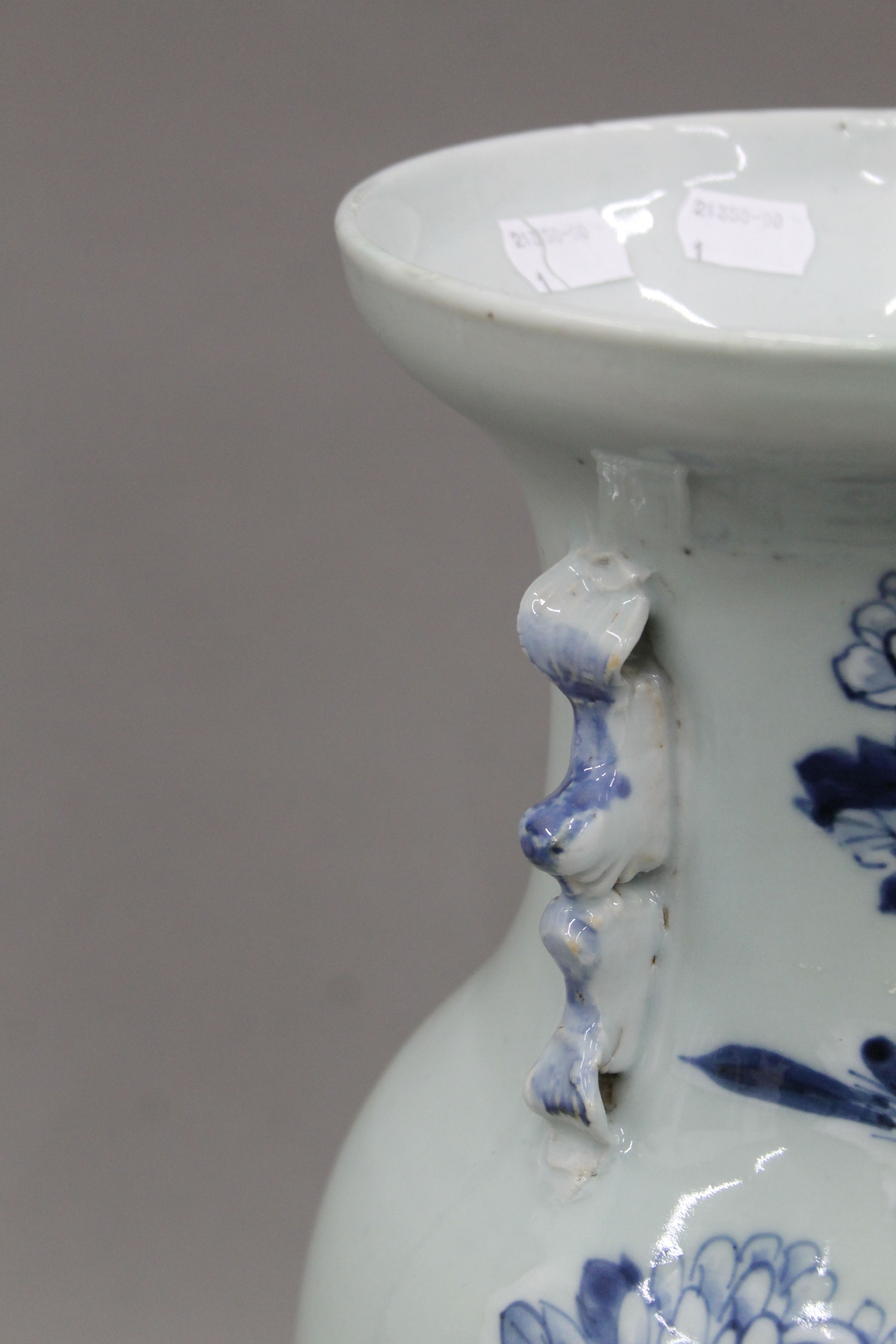 A 19th century Chinese pale celadon porcelain vase painted in underglaze blue with a bird amongst - Image 4 of 6