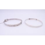 Two silver bracelets. Non-expandable bracelet 5.25 cm internal diameter.