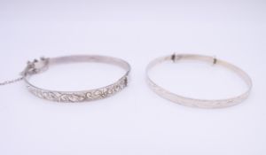 Two silver bracelets. Non-expandable bracelet 5.25 cm internal diameter.