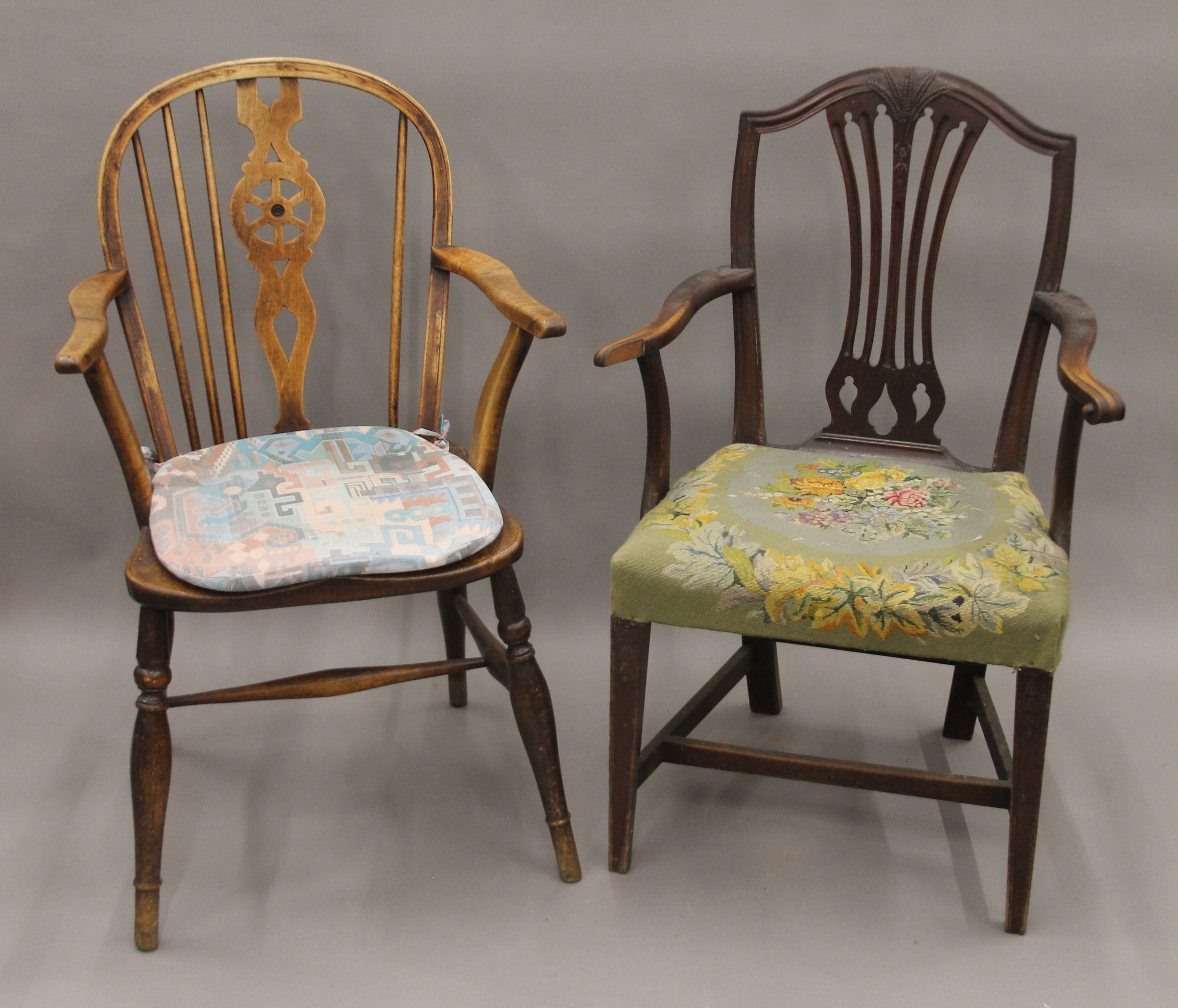 A 19th century elm seated wheel back armchair and a 19th century mahogany shield back open armchair.