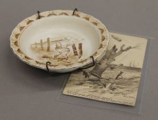 A Bruce Bairnsfather dish and postcard. The former 13 cm diameter.