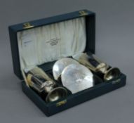 A pair of boxed limited edition silver goblets and coasters commemorating The 1300th Anniversary of
