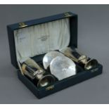 A pair of boxed limited edition silver goblets and coasters commemorating The 1300th Anniversary of