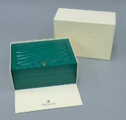 A vacant Rolex Oyster watch box.