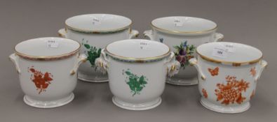 Five Herend porcelain cache pots. The largest 14 cm high.