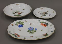 Three Herend porcelain plates. The largest 33 cm long.