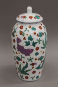A Chinese porcelain lidded vase. 40 cm high.