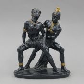 A model of two tribal dancers, the base inscribed G Ruggeri. 21.5 cm high.
