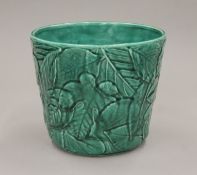 A Tiffany and Co green glazed planter. 16.5 cm high.